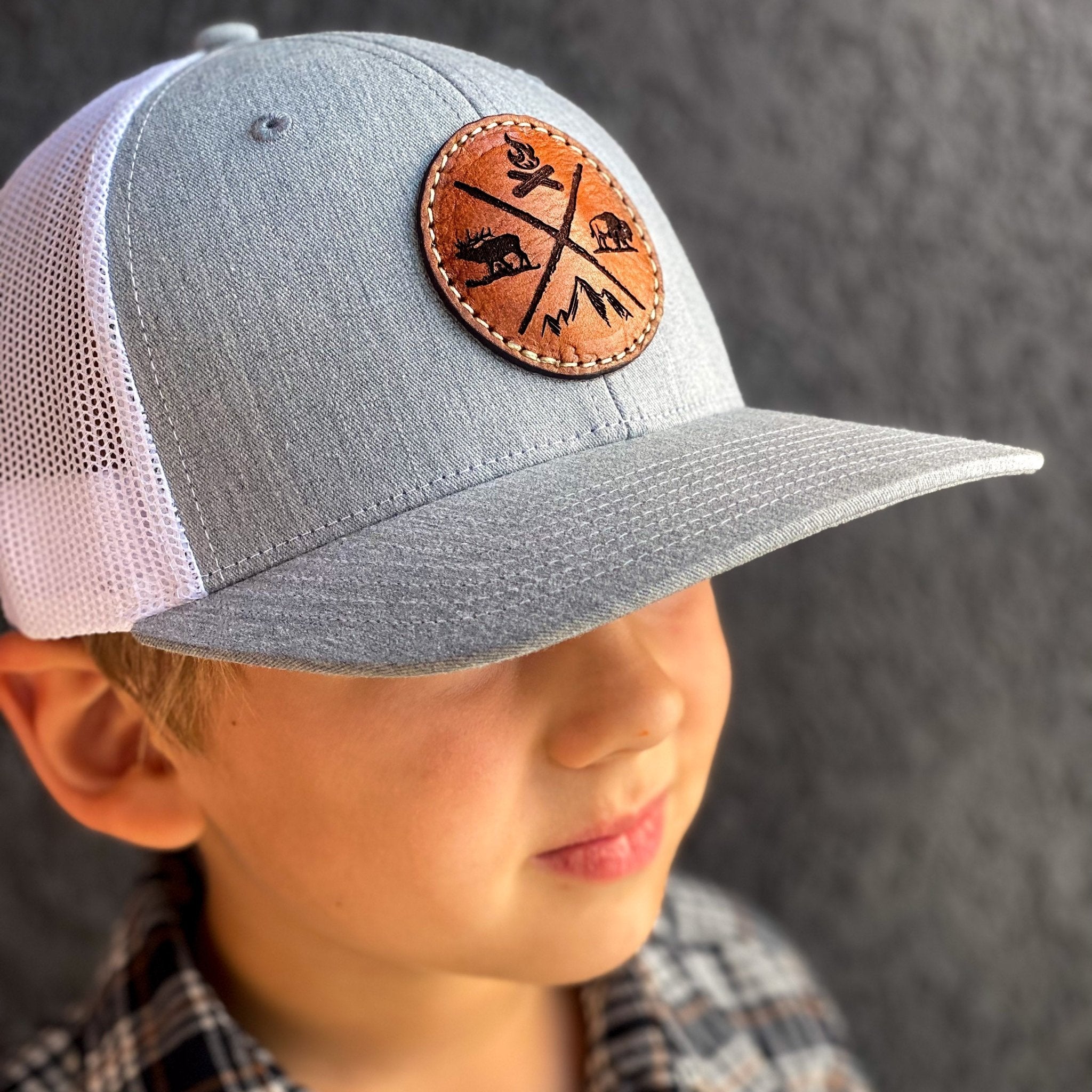 https://kclaserco.com/cdn/shop/products/adventure-more-youth-richardson-112-leather-patch-hat-512875.jpg?v=1642117417